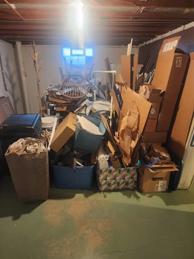 Roll-off dumpster container at job site for 2 Yard Dumpster Rental in Radnor